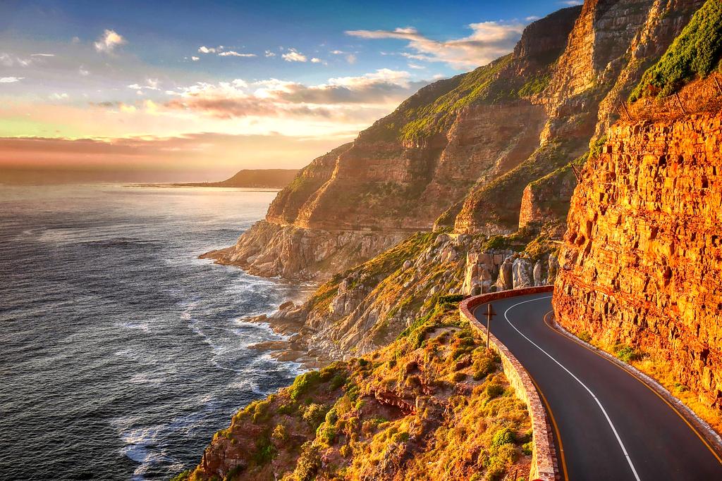 Dramatic ocean cliffs with crashing waves below